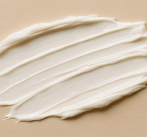 Smear of Monderma base cream on neutral palette
